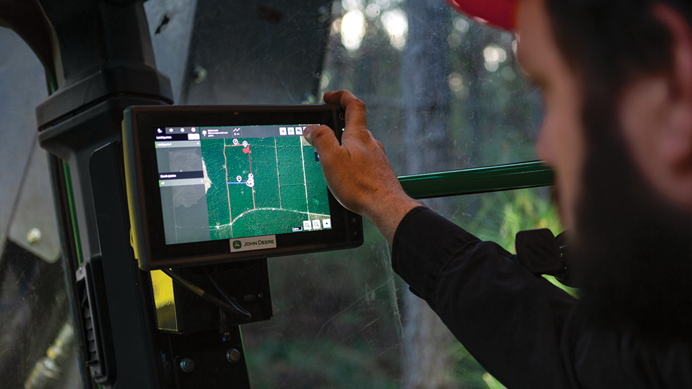 Inside the cab of forestry equipment