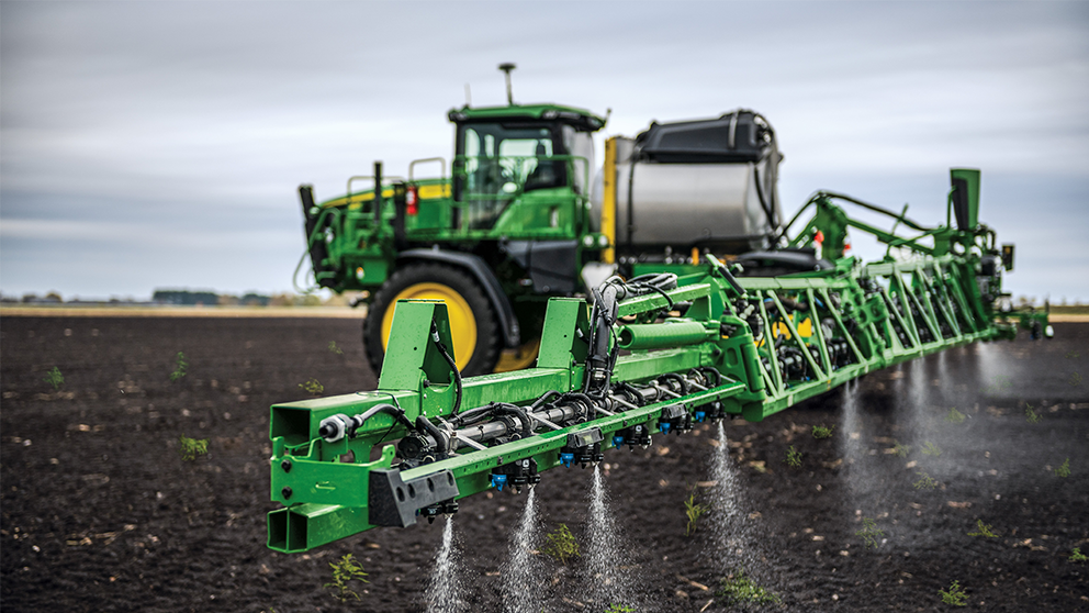 A tractor spraying in a field